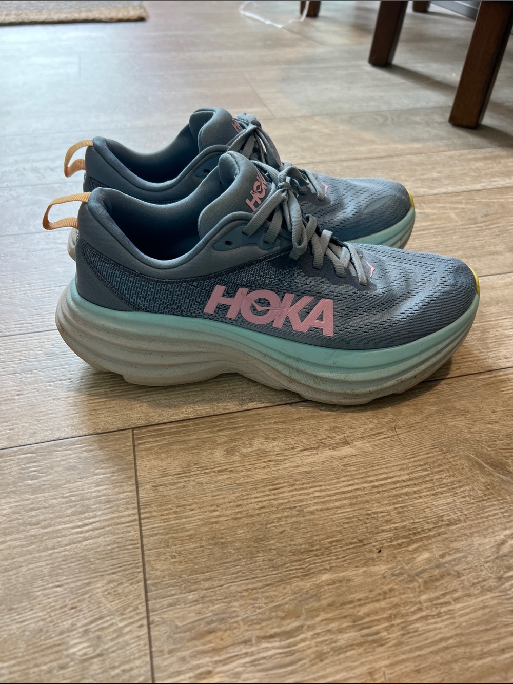 Hoka Women's Gray Running Shoes with Mint Midsole and Pink Logo
